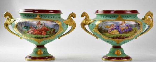 A pair of 19th century Continental twin-handled pedestal bowls of baluster form, each with painted