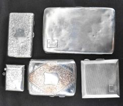 Three hallmarked silver cigarette cases, comprising a small example with floral decoration, 8.5 x