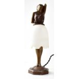 A painted spelter and alabaster figural table lamp in the form of a female, with her alabaster skirt