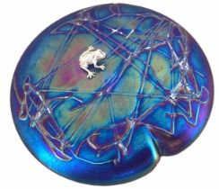 JOHN DITCHFIELD FOR GLASFORM; a silver frog on iridescent lily pad glass paperweight, diameter 11cm,