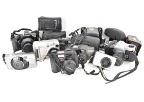 Various modern and vintage cameras to include a Ricoh RZ-1100, Fujifilm MX-600 Zoom, Minolta Dynax