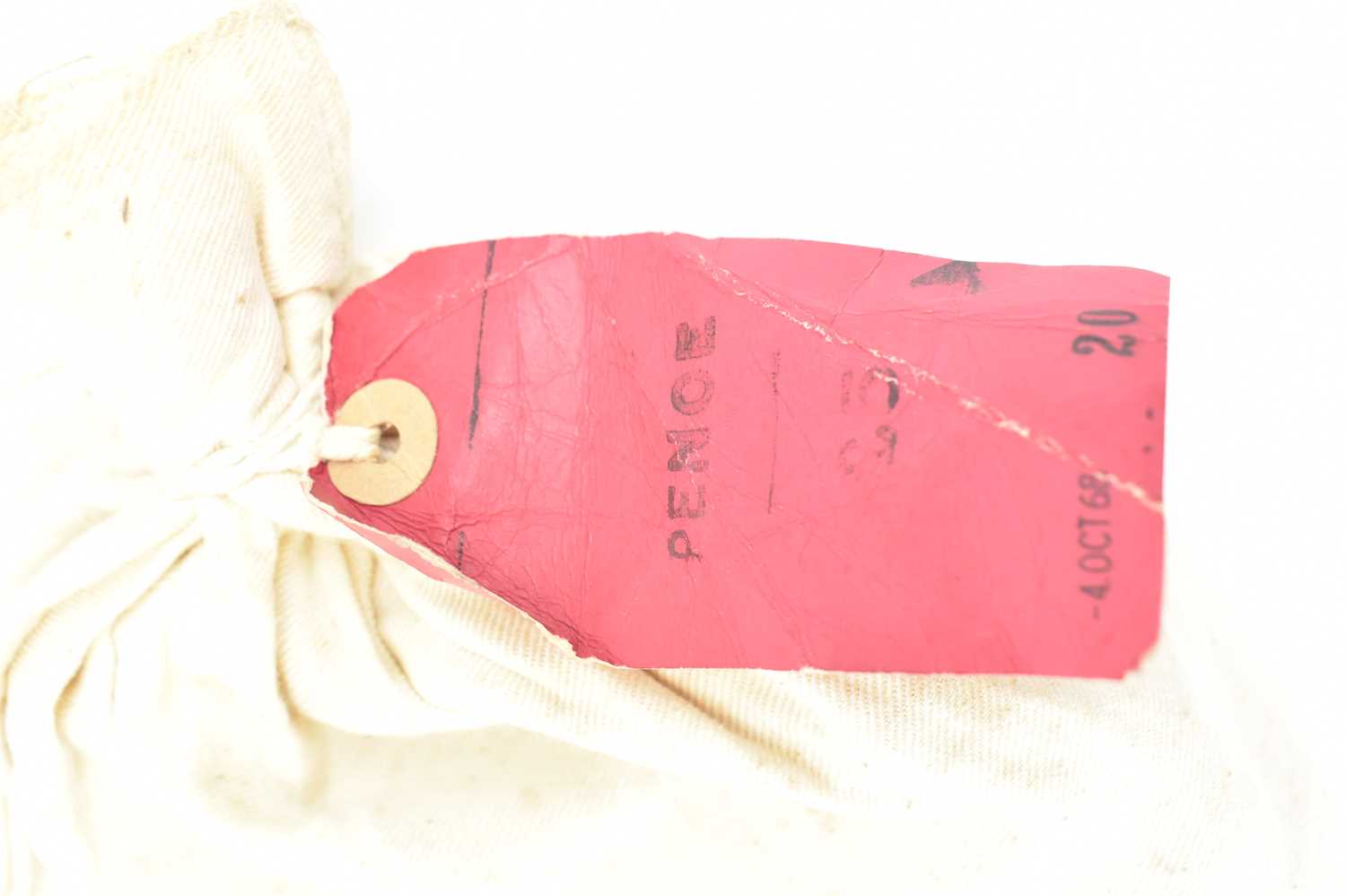 A lead sealed canvas bank bag containing a quantity of coins, the red tag states 'Pence' and the - Image 2 of 3