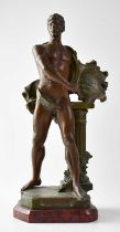 AFTER A. J. SCOTTE (1885-1905); a painted spelter figure of an artist holding a pen and a plaque,