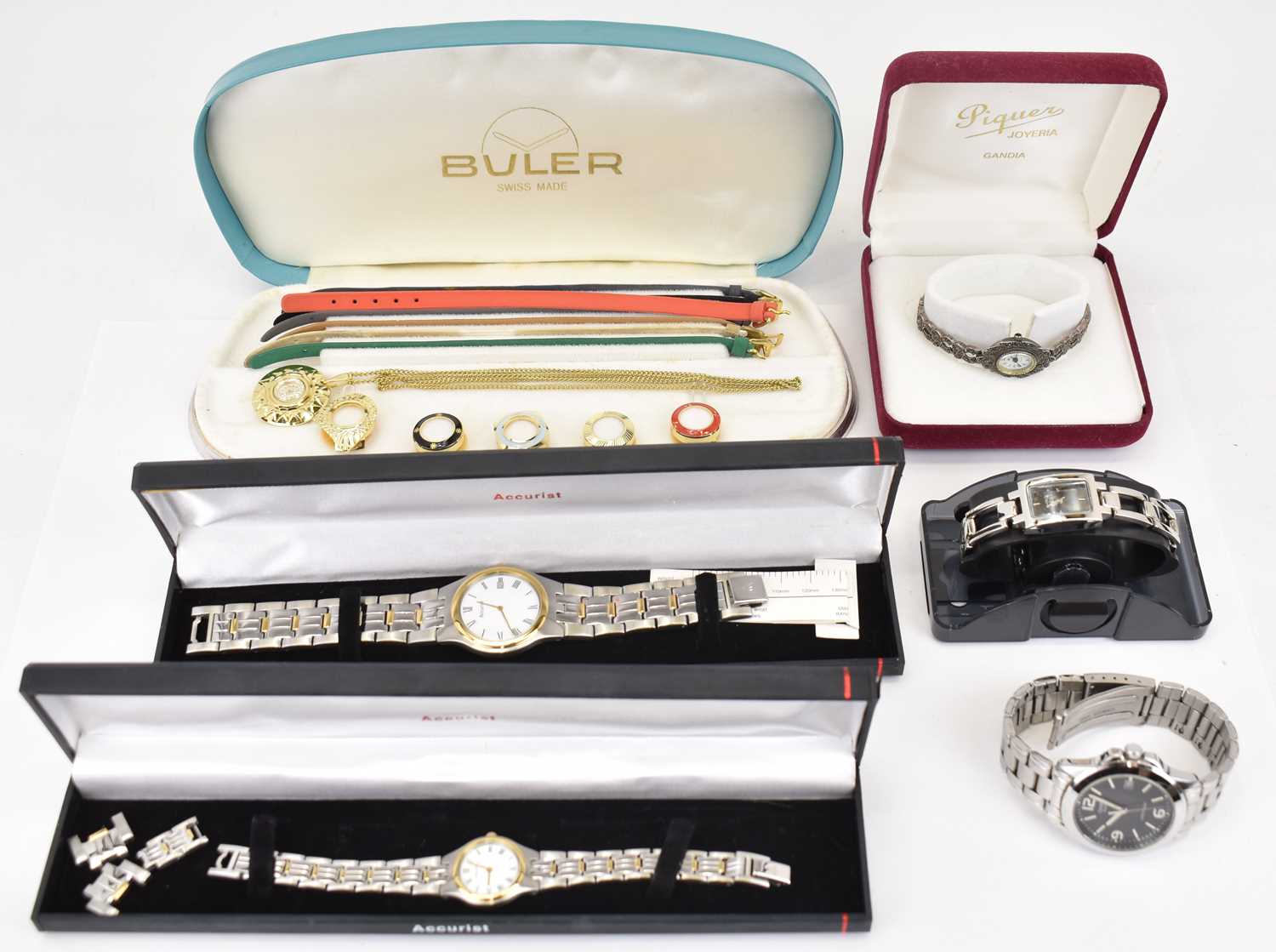 A six modern and vintage fashion watches to include 'his and hers' Accurist watches, a boxed Buler