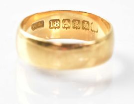 An 18ct gold wedding band, stamped '18', size O1/2, approx. 4.4g.