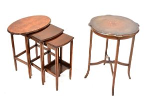 A Georgian-style mahogany oval topped nest of three tables, on square legs, height 63cm, together