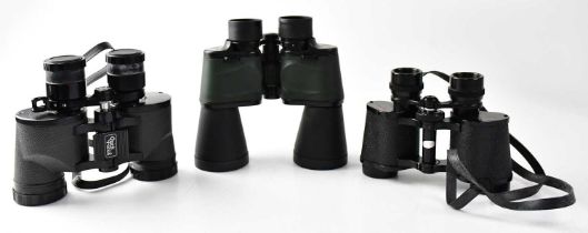 Three cased pairs of binoculars, comprising Wanderer coated optics 8 x 30 field glasses, Falcon Zoom