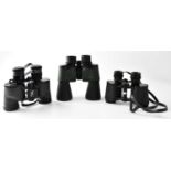 Three cased pairs of binoculars, comprising Wanderer coated optics 8 x 30 field glasses, Falcon Zoom