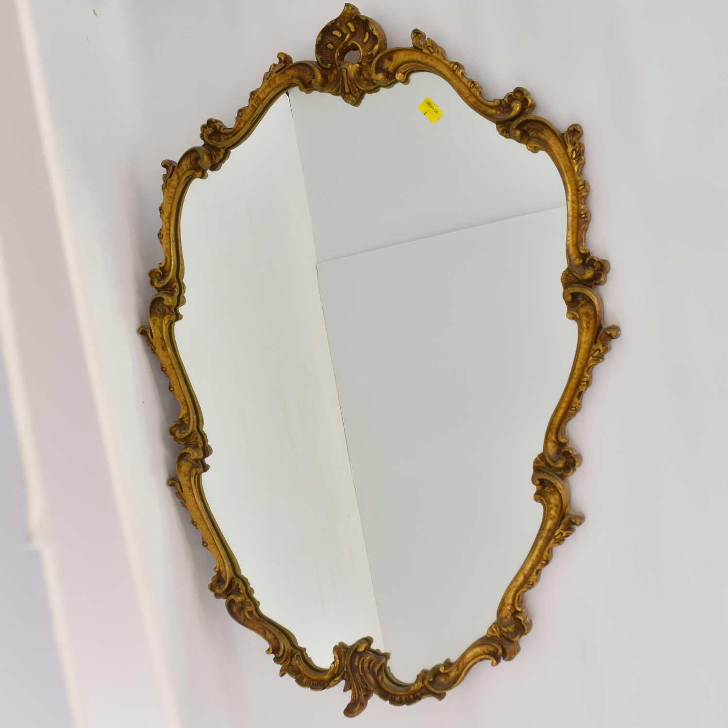 A circa 1950s large Rococo-style wall mirror with shell-shaped top, shield-shaped mirror in a - Image 2 of 2