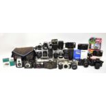 A quantity of cameras to include 35mm Nikkormat, Brownie Reflex 20, Samsung camcorder, Canon EOS