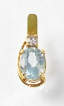 A yellow metal pendant set with aquamarine and small diamond above, approx. 0.7g.
