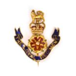 A 9ct gold and enamelled military badge for the Royal Regiment, 3.2 x 2.8xm, approx. 5.6g.