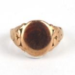 A 9ct rose gold gentlemen's signet ring with blank oval table, size O, approx. 4.2g.