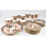 ROYAL CROWN DERBY; a twenty-seven piece part tea set in the 2451 pattern, comprising eight