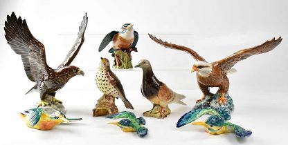 BESWICK; a collection of ceramic birds to include a graduated set of three wall-hanging kingfishers,