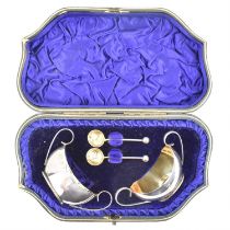 HILLIARD & THOMASON; a Victorian hallmarked silver cased set of salts of boat shape, with scroll