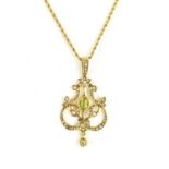 A 9ct gold Edwardian style pendant with central bezel set marquise cut peridot within open frame