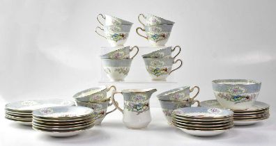 A Delphine part tea service with printed Asiatic pheasant and cherry blossom design, twelve cups and