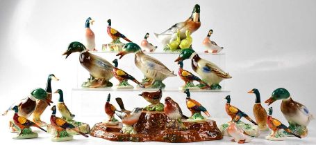 BESWICK; a five-tier tree stump base with three small birds, wren, robin and white throat, also