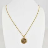 A 9ct gold dainty necklace, length 60cm, with a 9ct gold St. Christopher pendant, approx.4.3g.