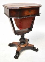 A Victorian rosewood sewing table of rectangular form with canted corners, with single frieze drawer