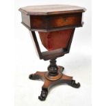 A Victorian rosewood sewing table of rectangular form with canted corners, with single frieze drawer