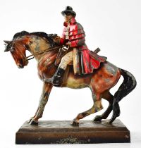 An early 20th century painted spelter figural match striker in the form of Dick Turpin on horseback,