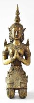 A bronze figure of a Thai temple watcher in the form of a kneeling female figure in ornate dress,