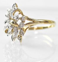 A 9ct gold ring set with small diamonds in foliate style, stamped 375, size Q, approx. 2.4g.