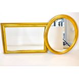 Two modern gilt wood mirrors comprising an oval example, 70 x 60cm, and a rectangular bevel edge