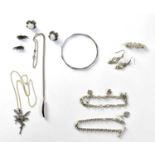 A group of 925 silver jewellery, to include a bangle, a bracelet set with four charms, a further