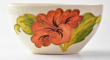 MOORCROFT; a 'Hibiscus' pattern cream ground oval bowl, 8.5 x 16.5 x 9cm. Condition Report: - It
