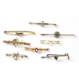 Nine bar brooches comprising six 9ct gold examples set with various stones, to include amethyst