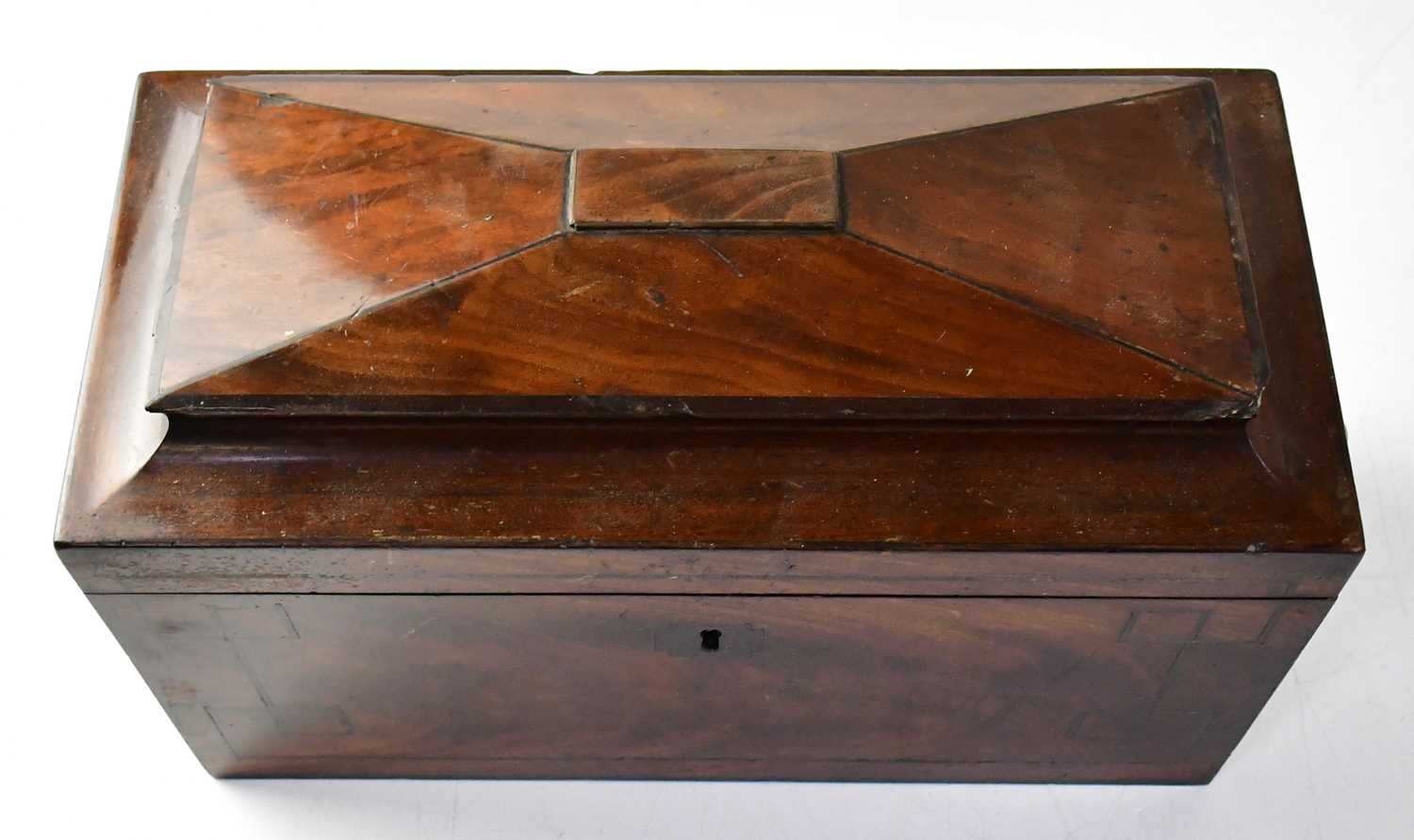 A Victorian flame mahogany line inlaid sarcophagus form tea caddy with three internal divisions, - Image 2 of 2