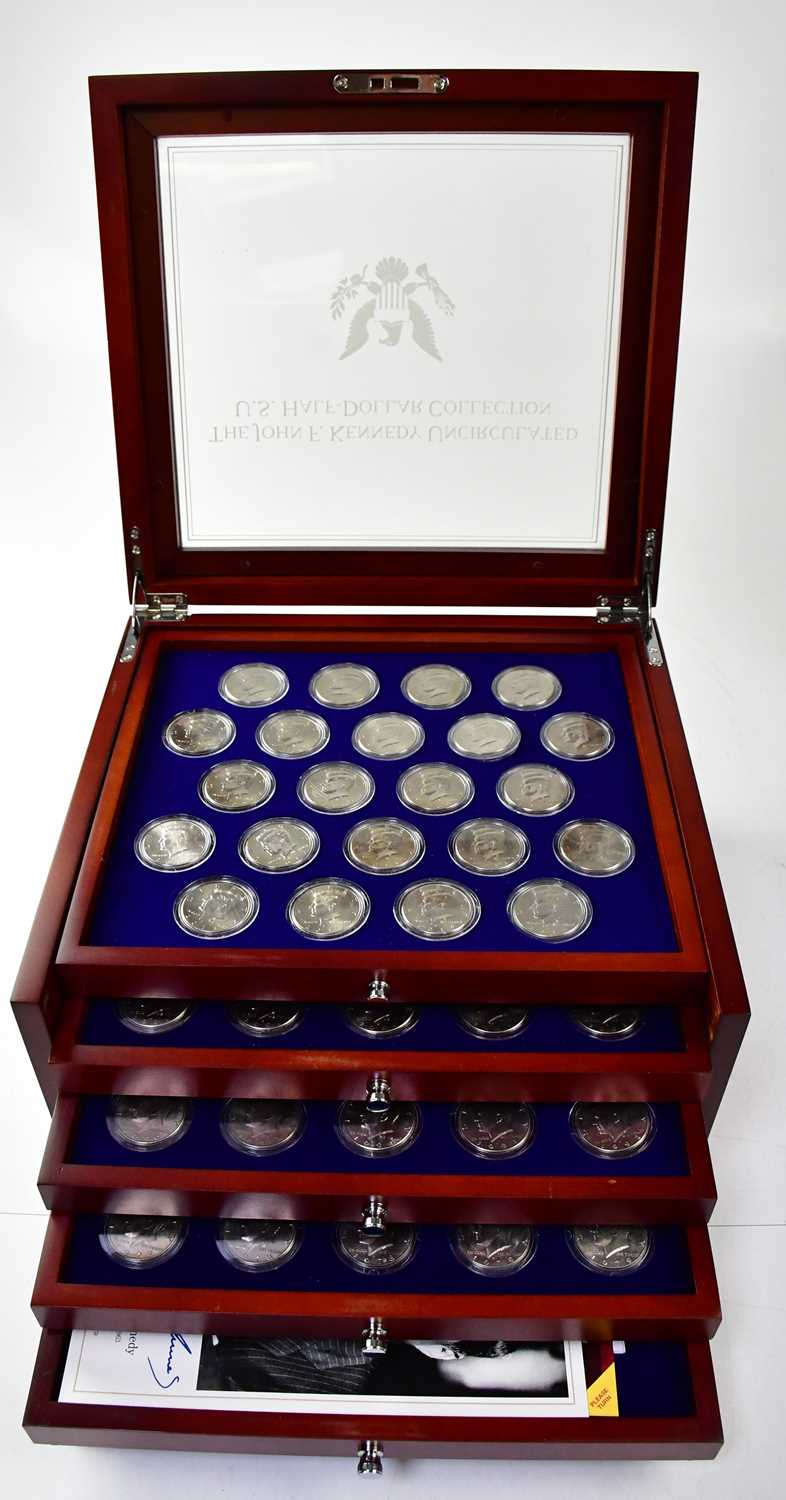 DANBURY MINT; The John F. Kennedy Uncirculated U.S. Half-Dollar Collection, comprising ninety-one