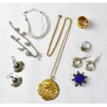 A quantity of silver jewellery to include a sterling silver charm bracelet and a sterling silver