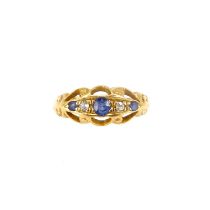 An 18ct gold Victorian-style ring set with sapphires and tiny diamonds, size N, approx. 3.2g.
