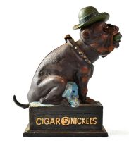 A novelty money box 'Ole Puffer' modelled as a seated bulldog wearing a hat, smoking a cigar,