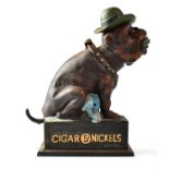A novelty money box 'Ole Puffer' modelled as a seated bulldog wearing a hat, smoking a cigar,