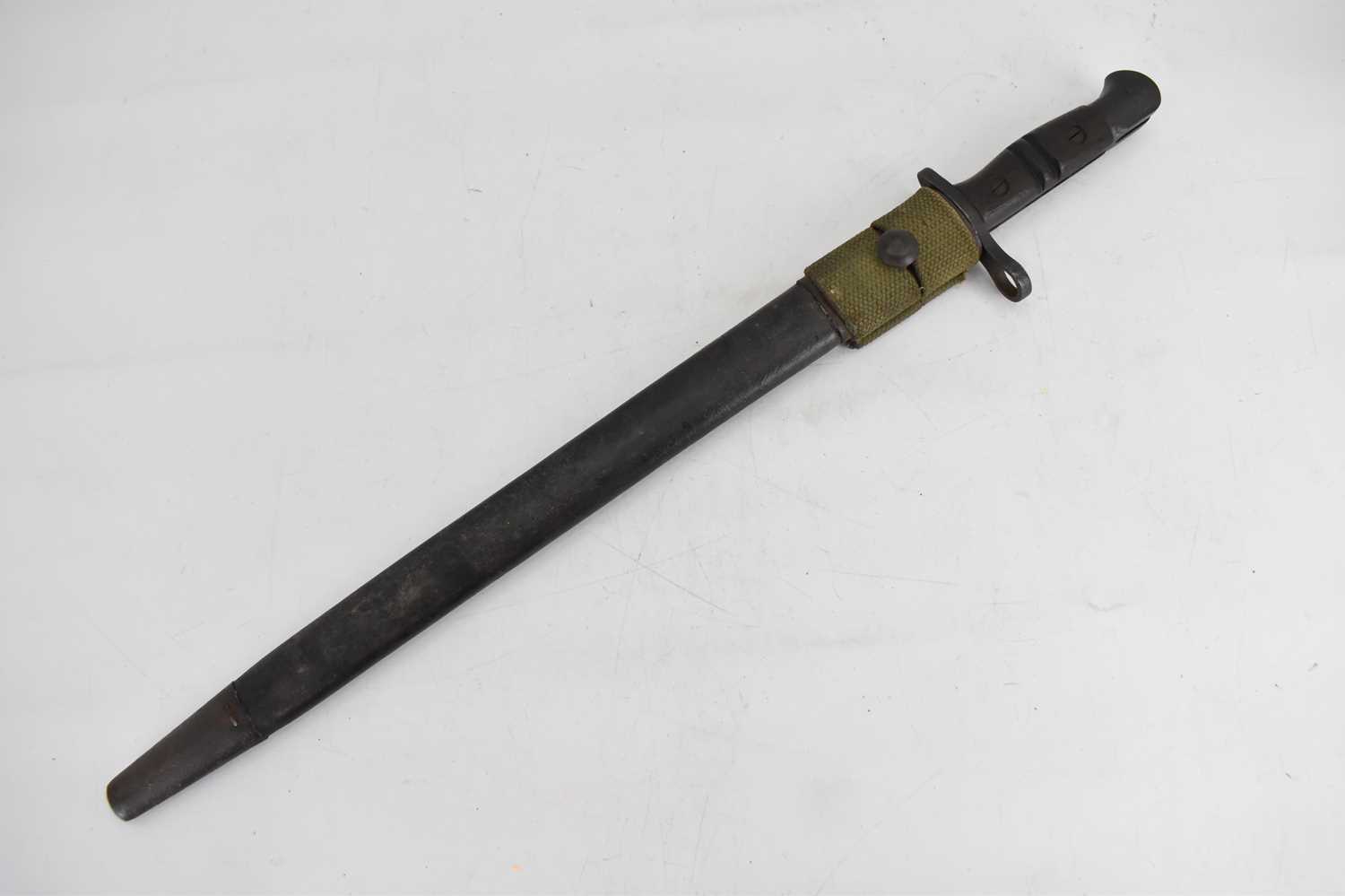 REMMINGTON; a WWI 1913 pattern bayonet, dated 16/2/1913, with relevant markings and leather - Image 8 of 12