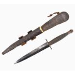 A WWII third pattern Fairbairn Sykes fighting knife, unmarked, with brass ribbed handle, double-