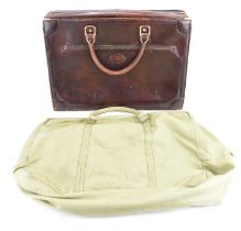 BALLY OF SWITZERLAND; a small leather suitcase with pigskin interior, luggage straps and outer