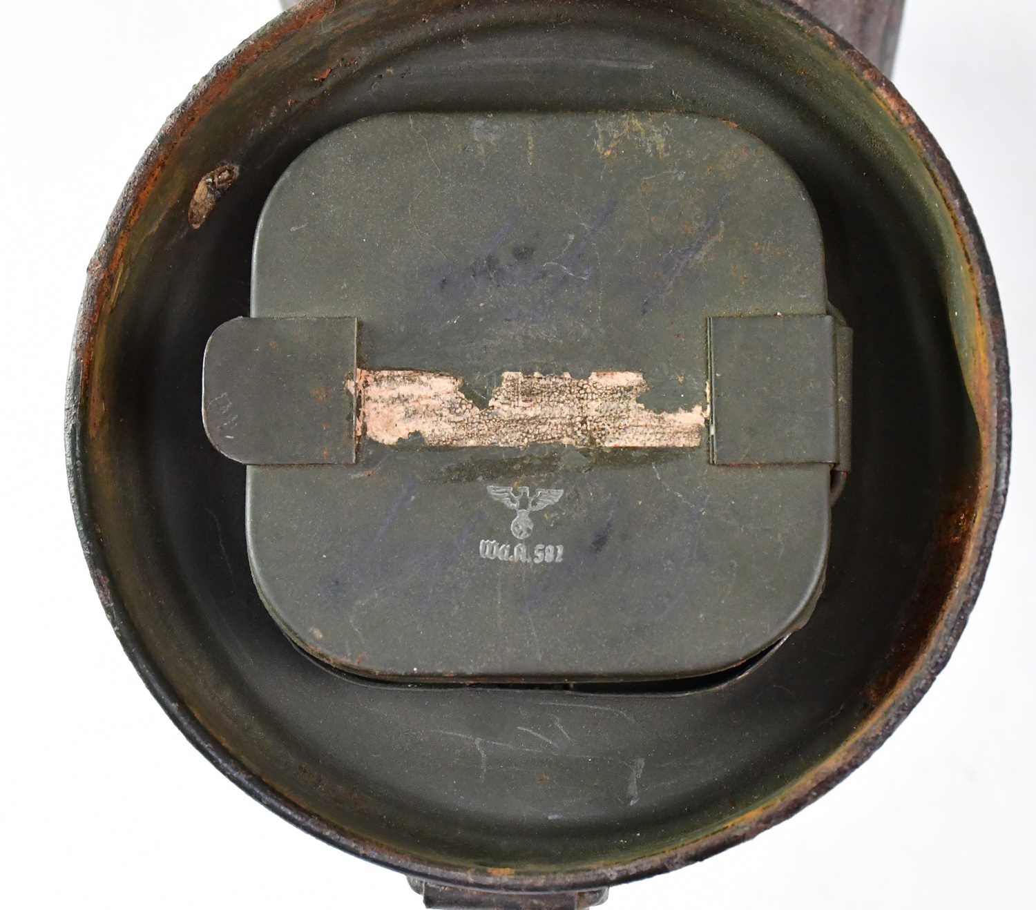 A WWII German M30 gas mask with FE41 filter in original tin, a WWI period French M15 infantry helmet - Image 2 of 3
