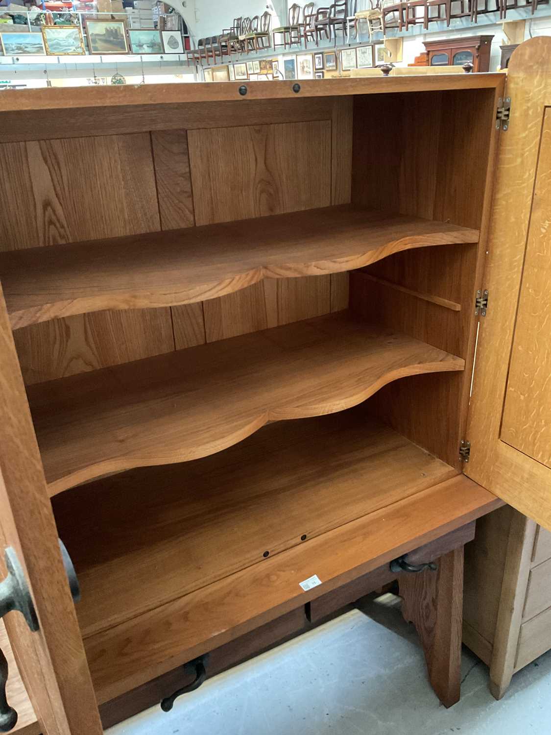 A modern oak cupboard on stand, with two short drawers, with naturalistic style wrought ironwork - Image 3 of 5