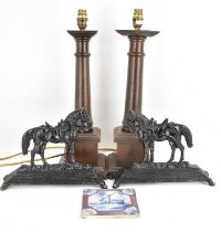 A pair of 19th century cast iron horse doorstops, later painted black, 21 x 28cm, a pair of turned