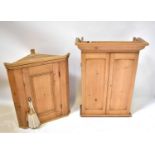 A pine corner wall-hanging cupboard with fielded and panelled door, 86 x 72 x 42cm, together with