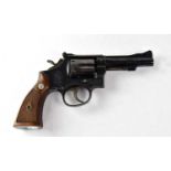 SMITH & WESSON; a deactivated Mod 15 .38" six-shot double action revolver, with 4" barrel stamped to