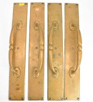 Two pairs of large brass door handles, door plate 54 x 8cm, applied handle length 30cm (4).