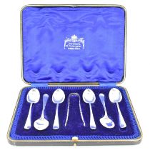 COOPER BROS & SONS LTD; a caset set of six George V hallmarked silver teaspoons and sugar tongs,