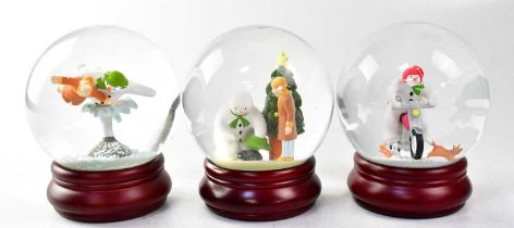 THE SNOWMAN; three Coalport Characters snowglobes, comprising 'Hold on Tight', dated 2003, '